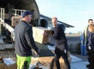 UÇAĞI PRENS KARŞILADI, MALZEMEYİ BAKAN TAŞIDI