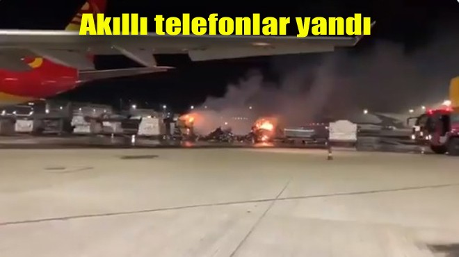 HAVALİMANINDA KARGO PAKETLERİ YANDI